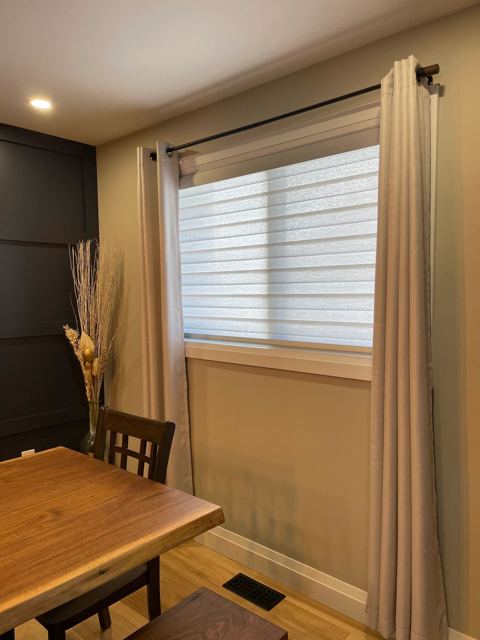 Layered shade in a dining room